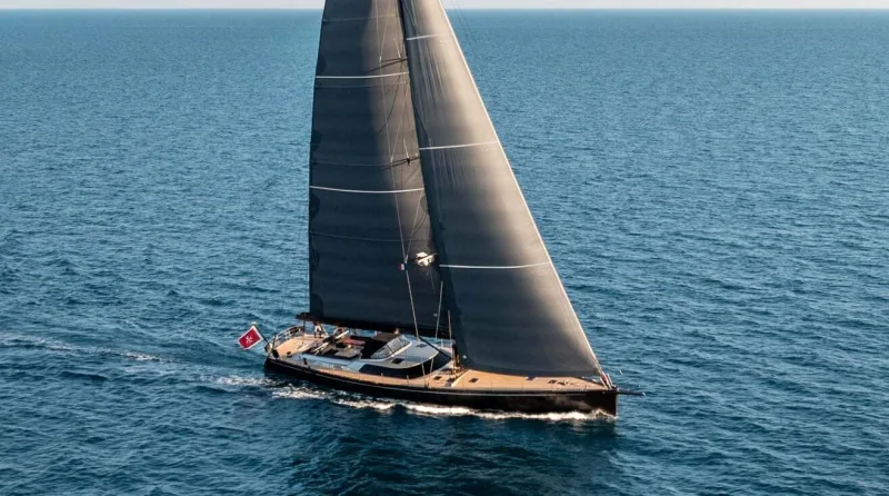 A sailing yacht under full sail on open water