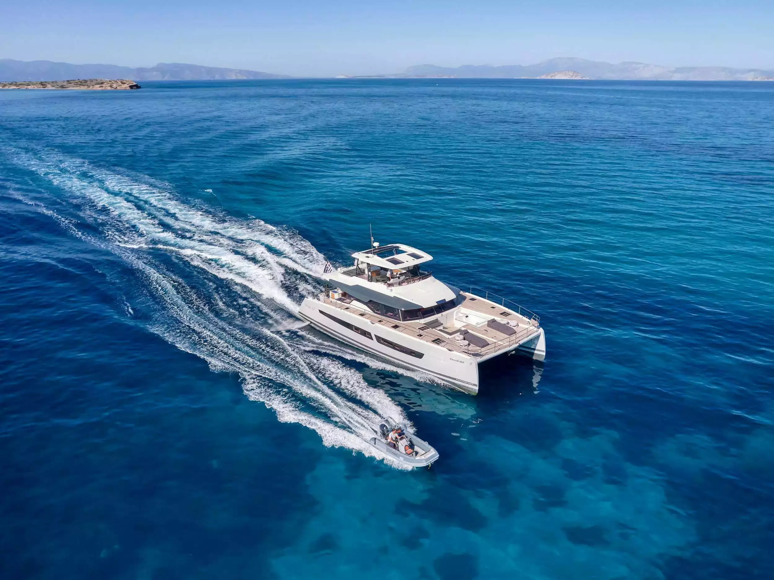 ChristAl MiO by Fountaine Pajot - Special Offer for a private Power Catamaran Charter in Santorini with a crew